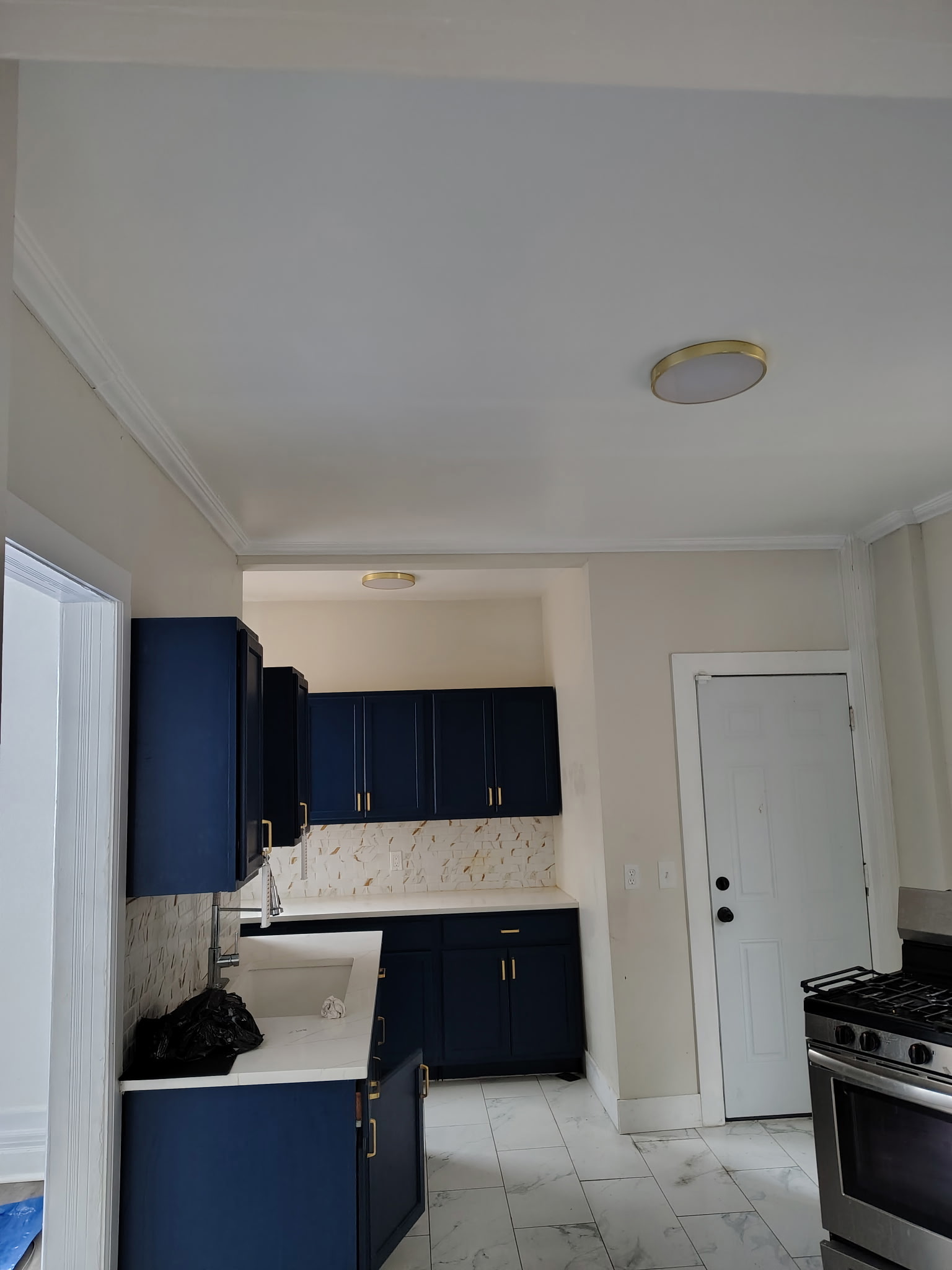 Finished kitchen cabinets and countertops installed