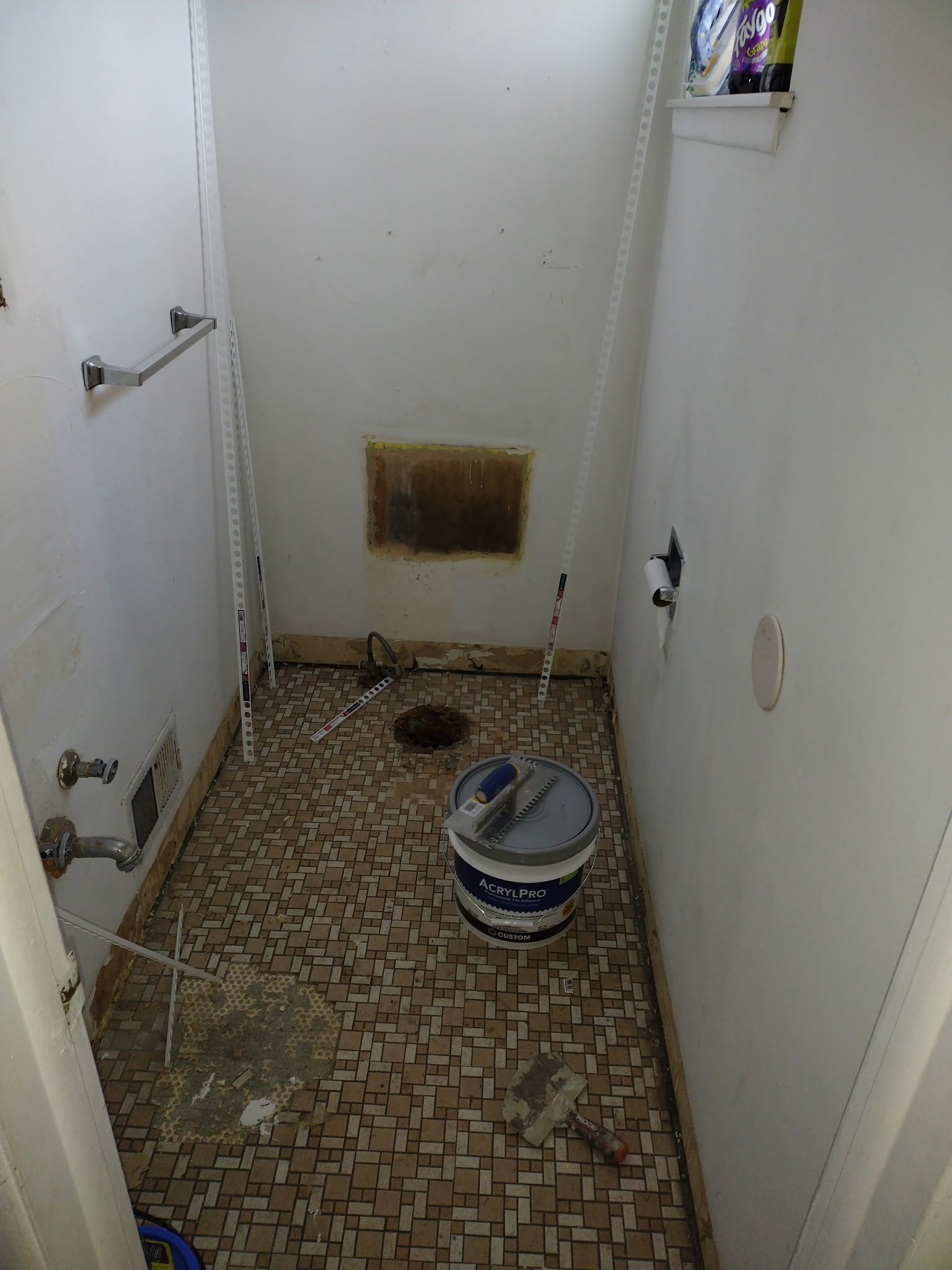 Half-bath floor before work began